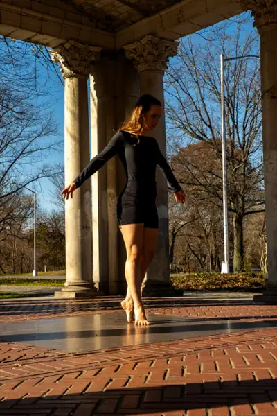 Gentle pose at columns, graceful movement