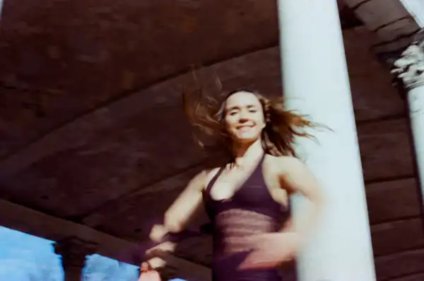 Joyful smile close-up with hair flowing naturally