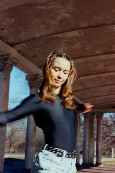 Gentle movement with eyes closed, peaceful expression